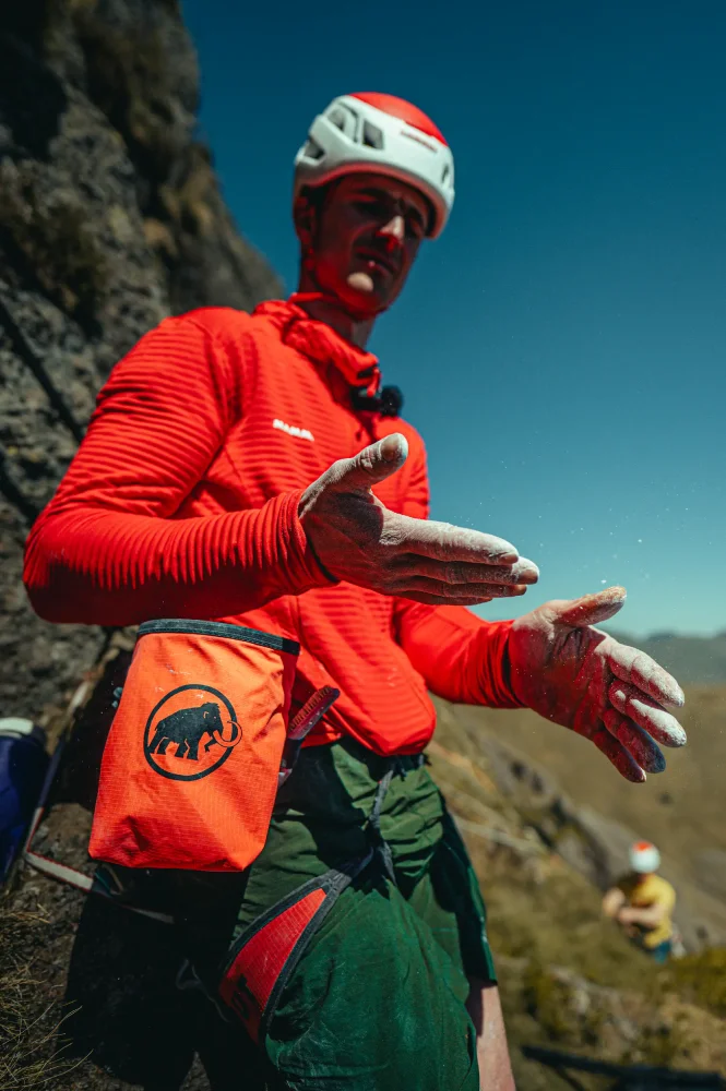 Adam Ondra getting ready for climbing route Lexicon with Mammut Sender Light Chalk Bag