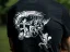 Detail of the "I Hate Toehooks" art on the back side of Adam Ondra black men's T-shirt