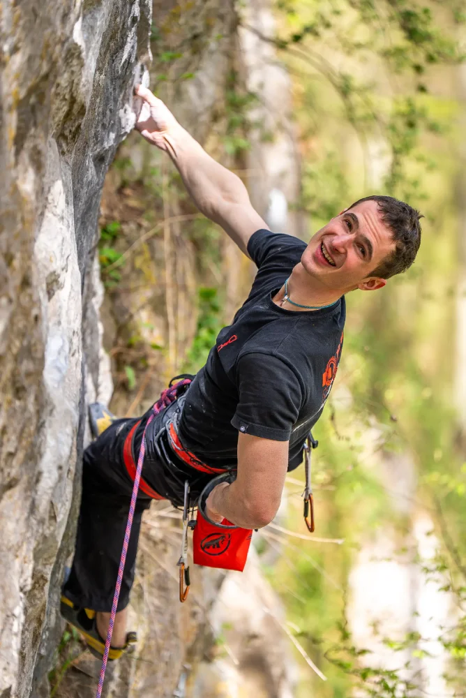 Adam climbing with Adam Ondra Sender Light Chalk Bag