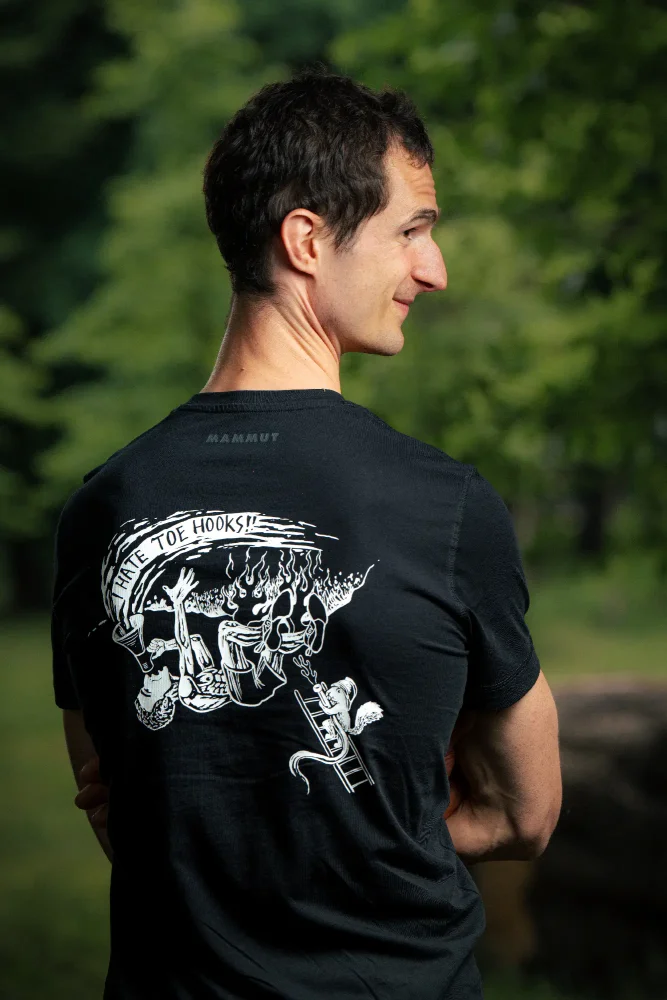 Adam Ondra wearing his "I hate toehooks" T-shirt, back side