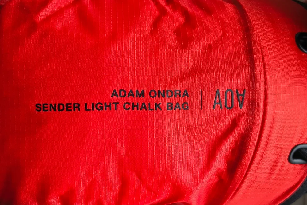 Adam Ondra Sender Light Chalk Bag detail on name and AO logo